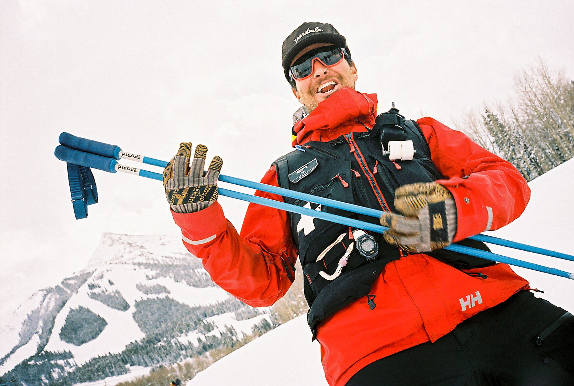An image of a skier playing ski poles like a guitar