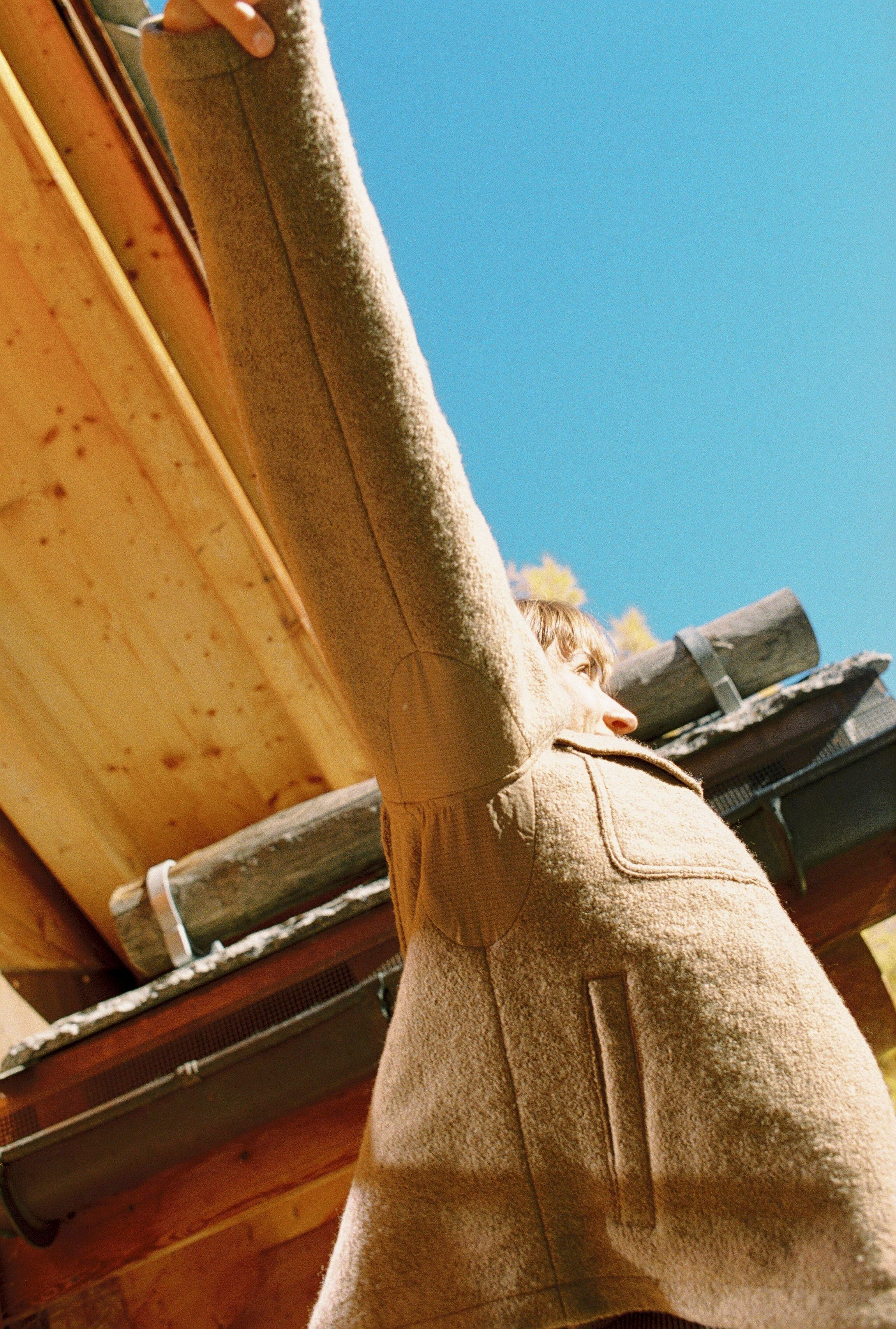 An image of a woman in a wool Sport Coat 
