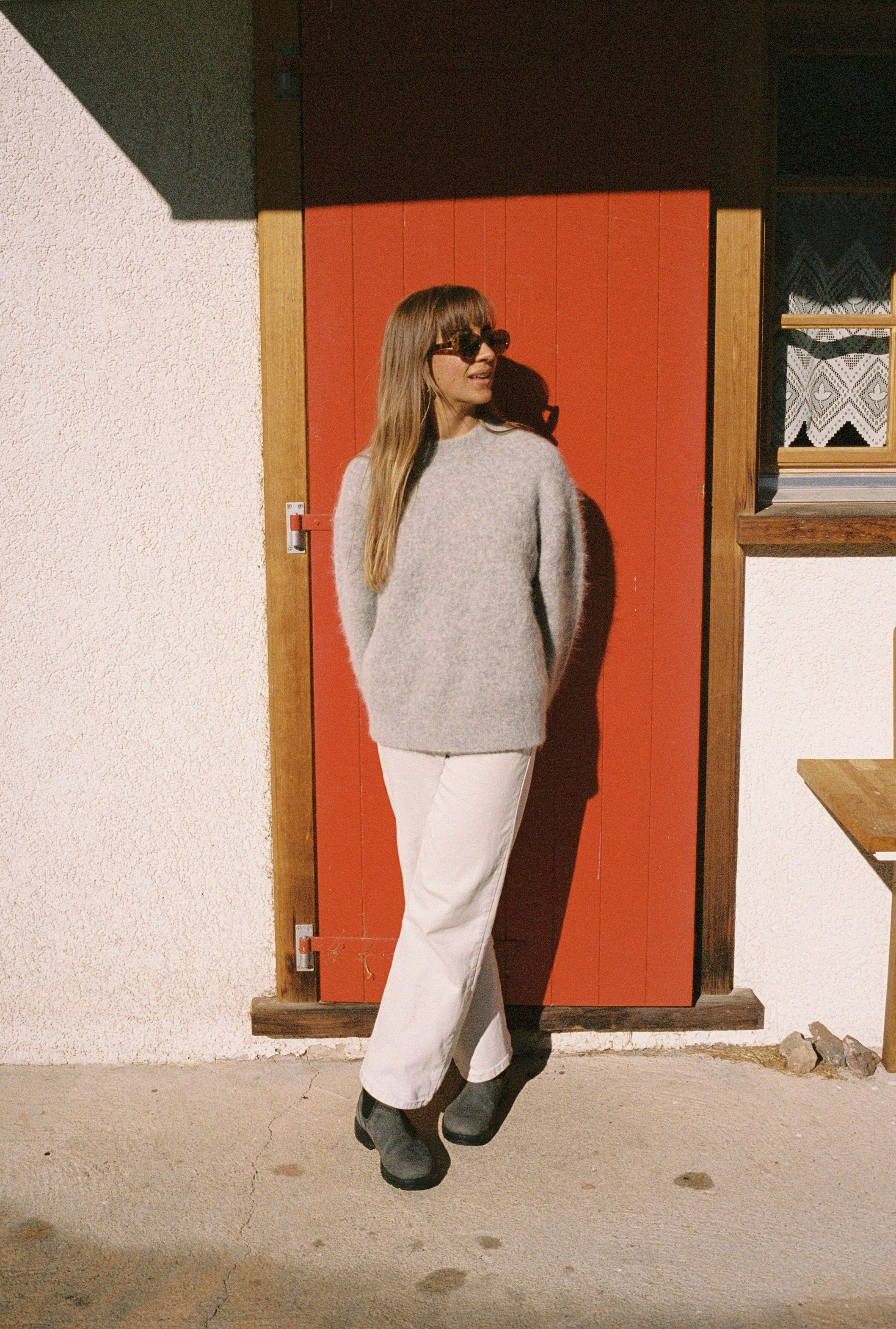 An image of a woman in a sweater in Zermatt