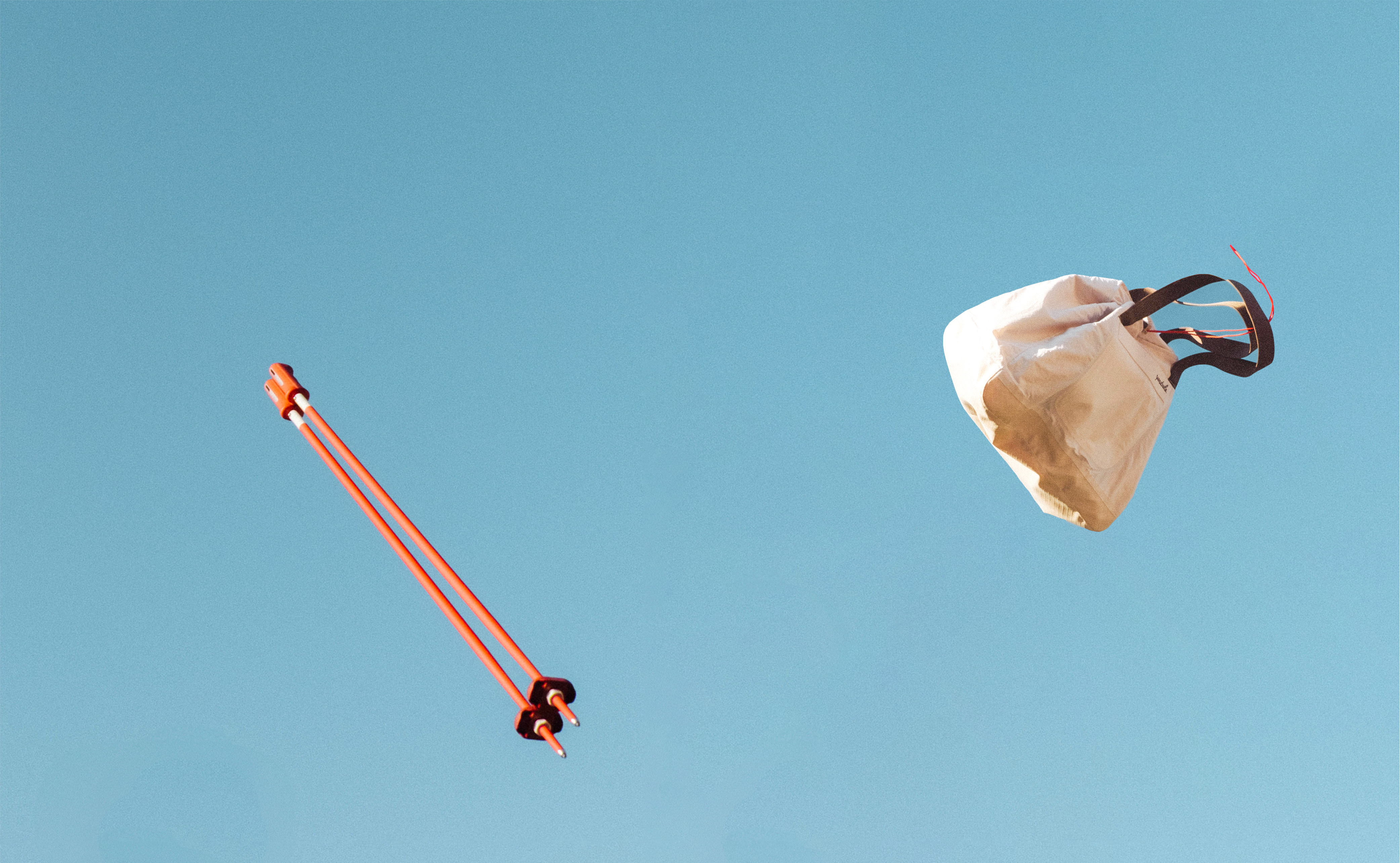 A Day Bag and P1 Poles flying in the air