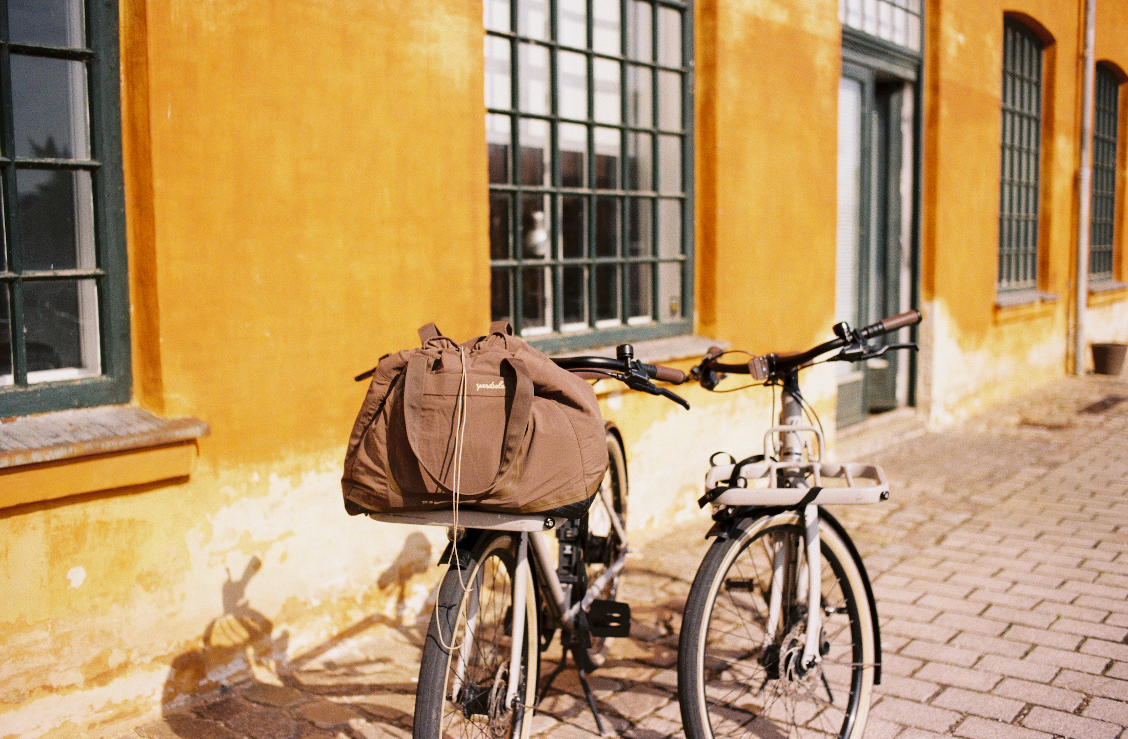Image of a bike near an orange wall