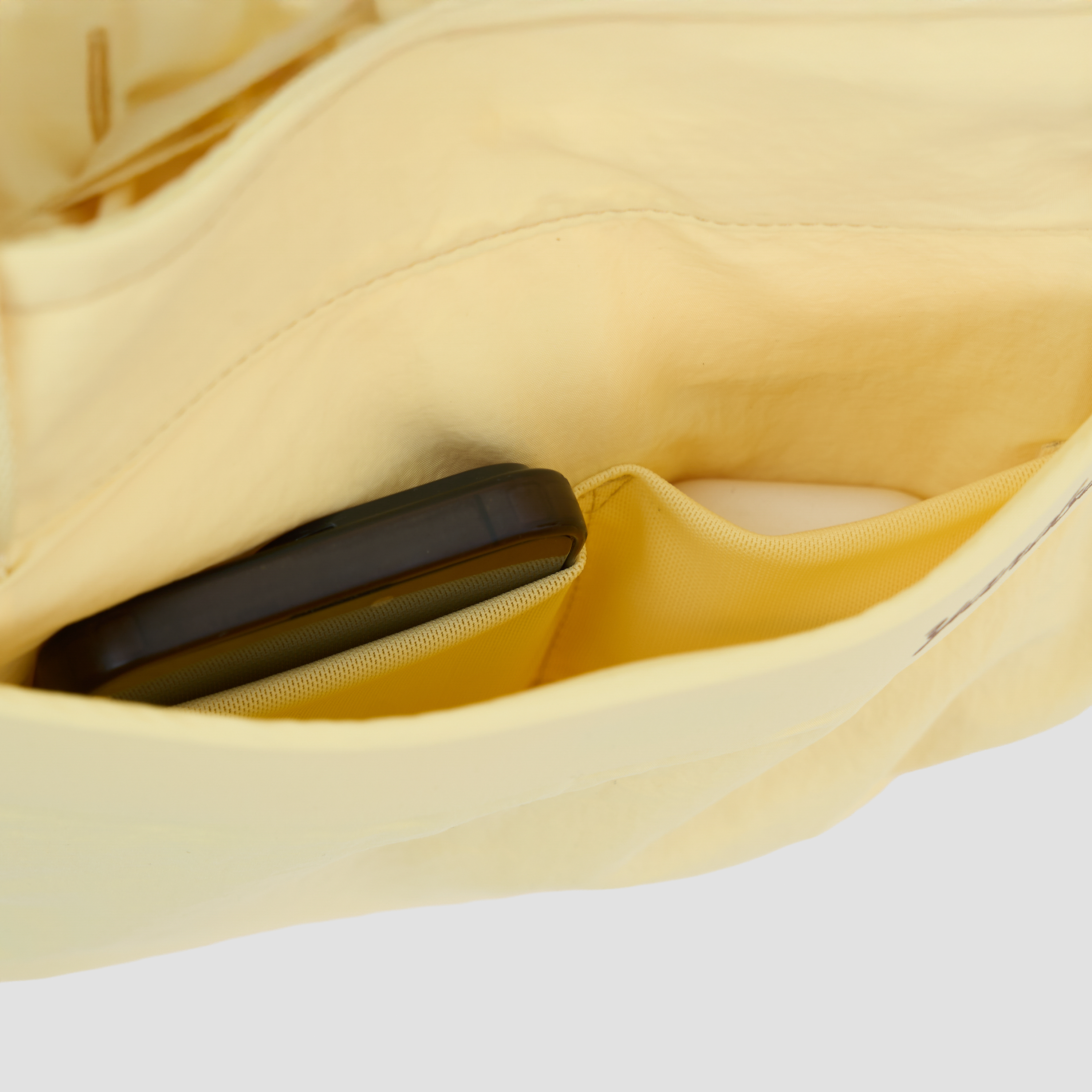 An image of Day Bag Butter pocket