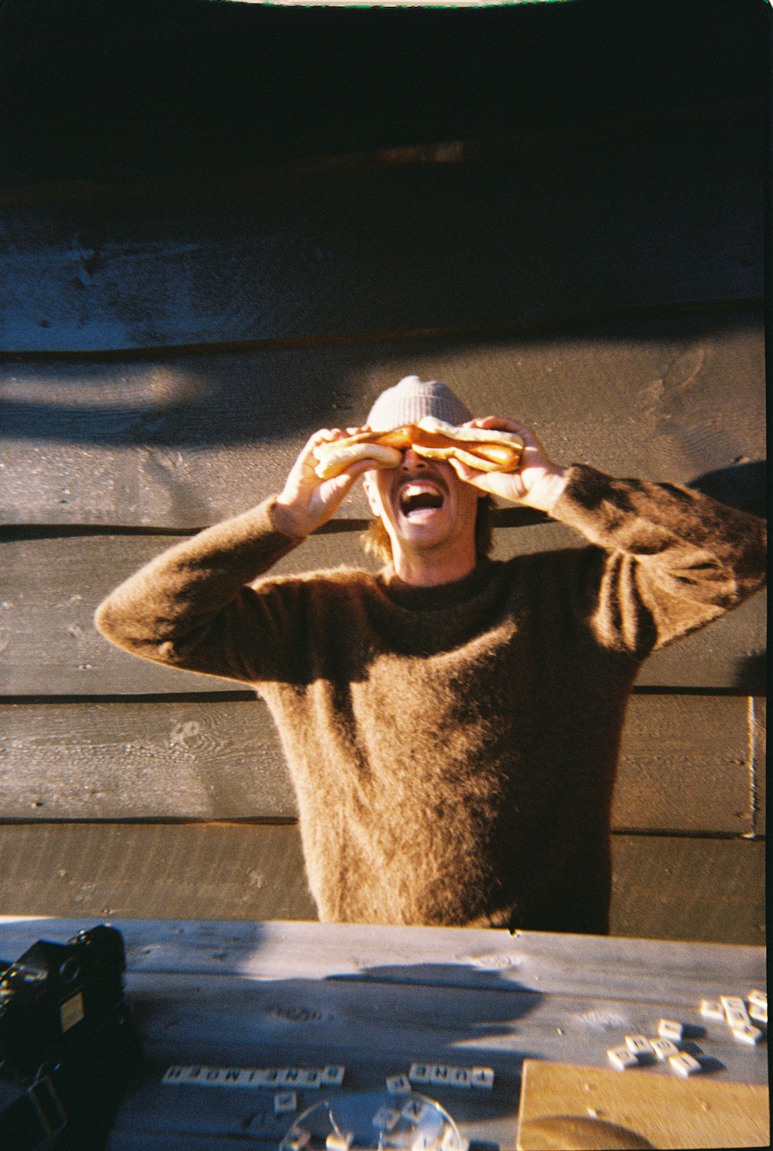 Image of someone with hot dogs