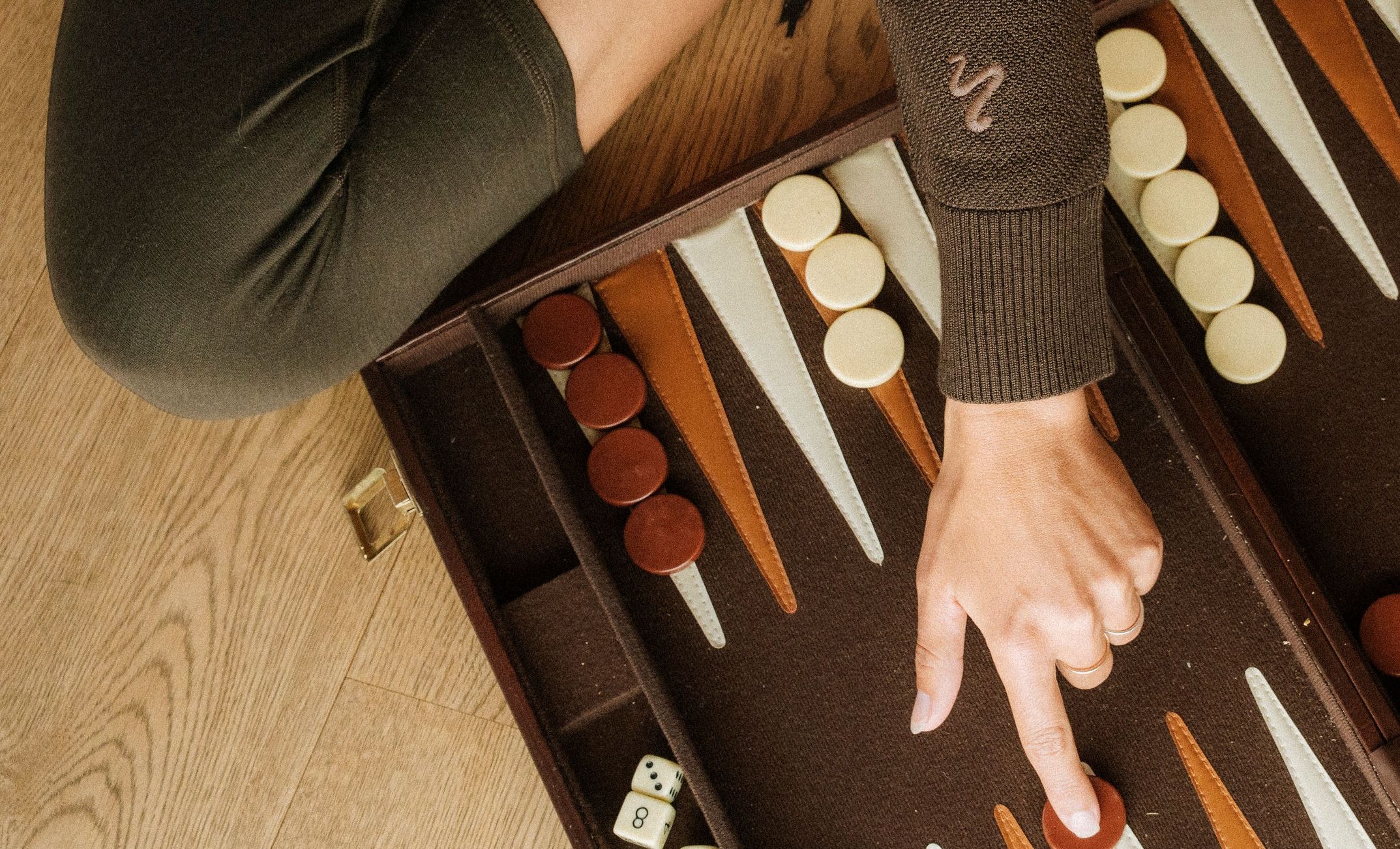 Merino wool baselayer top on backgammon board