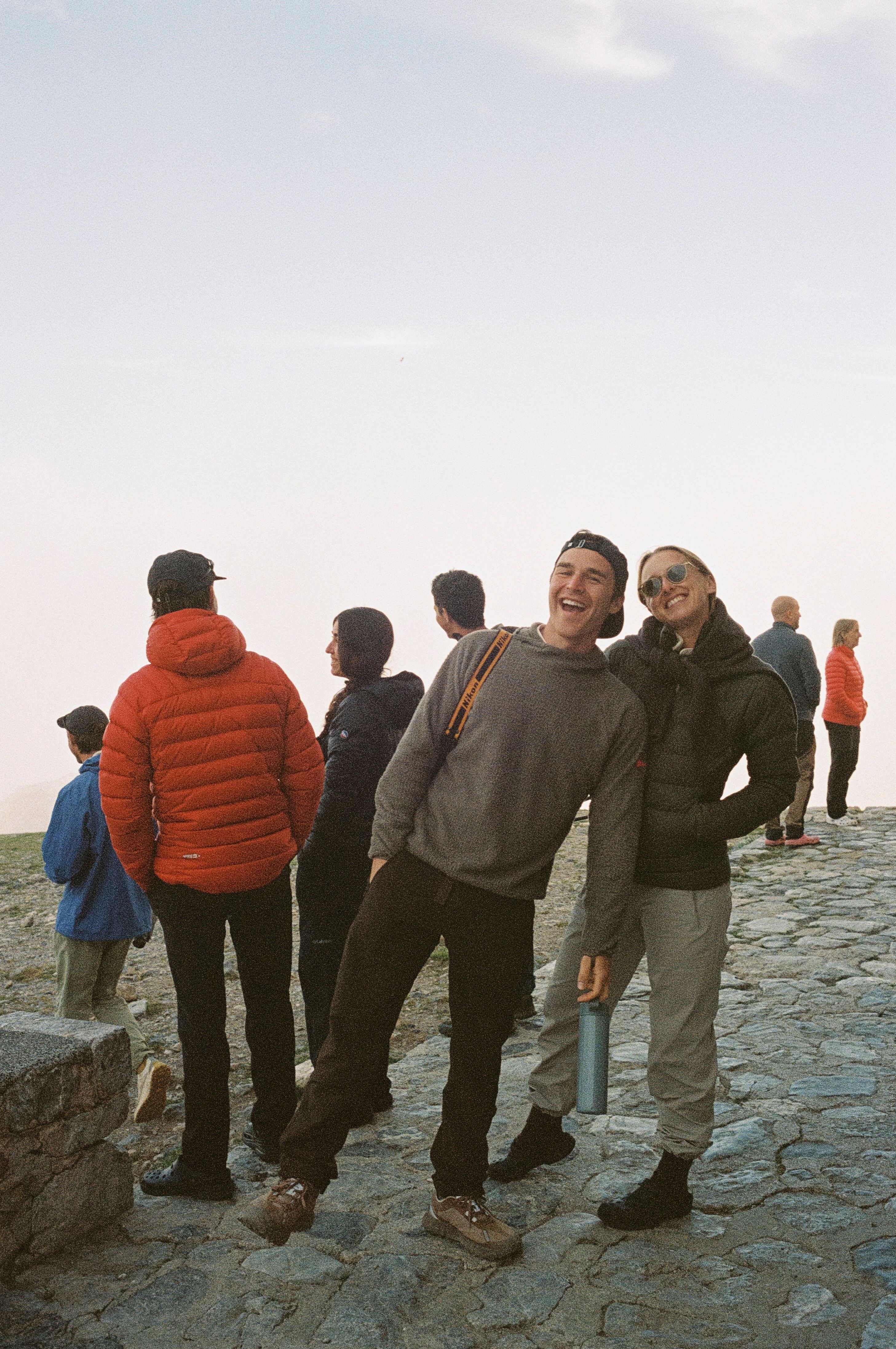 Cristina and Kelly smiling on a hiking trip