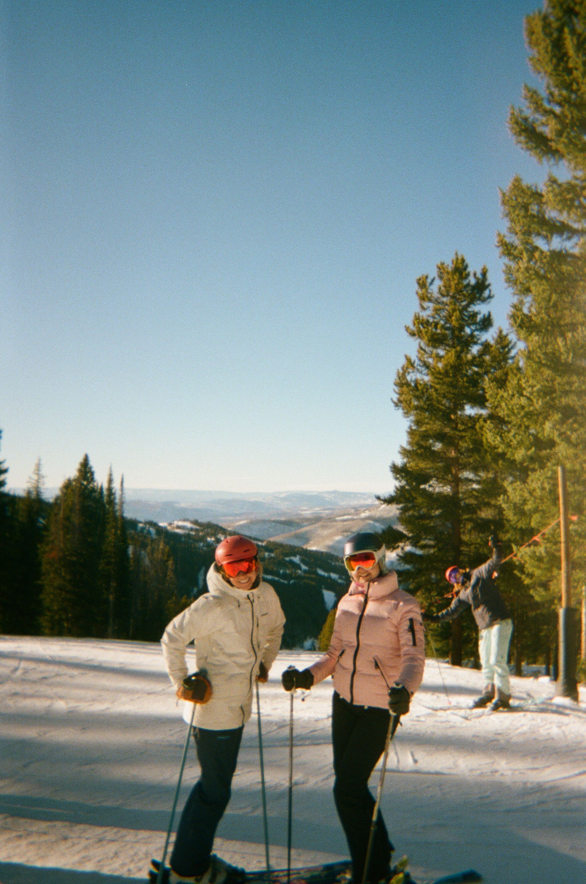 An image of two skiers
