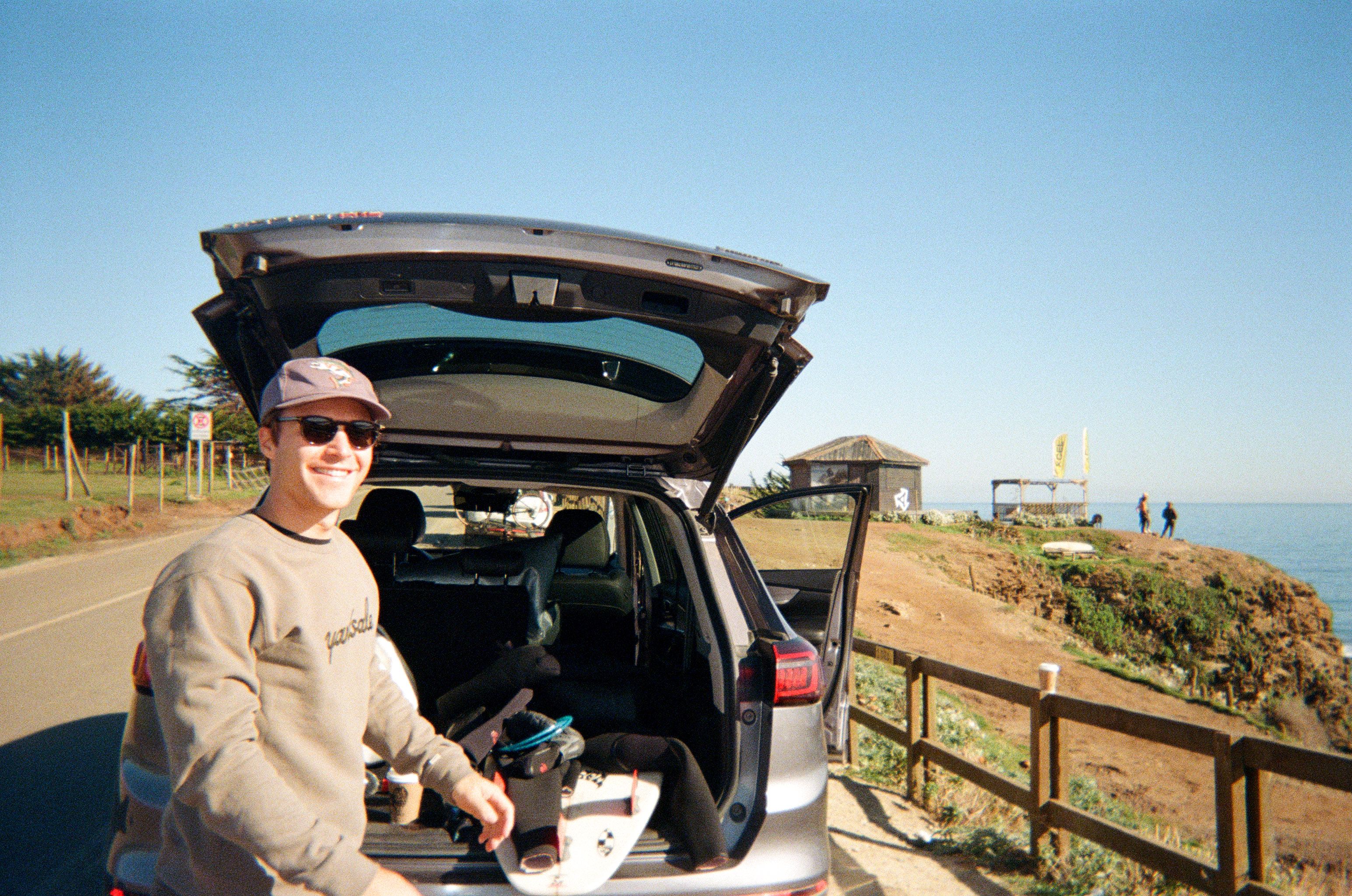 An image of a person about to go surfing