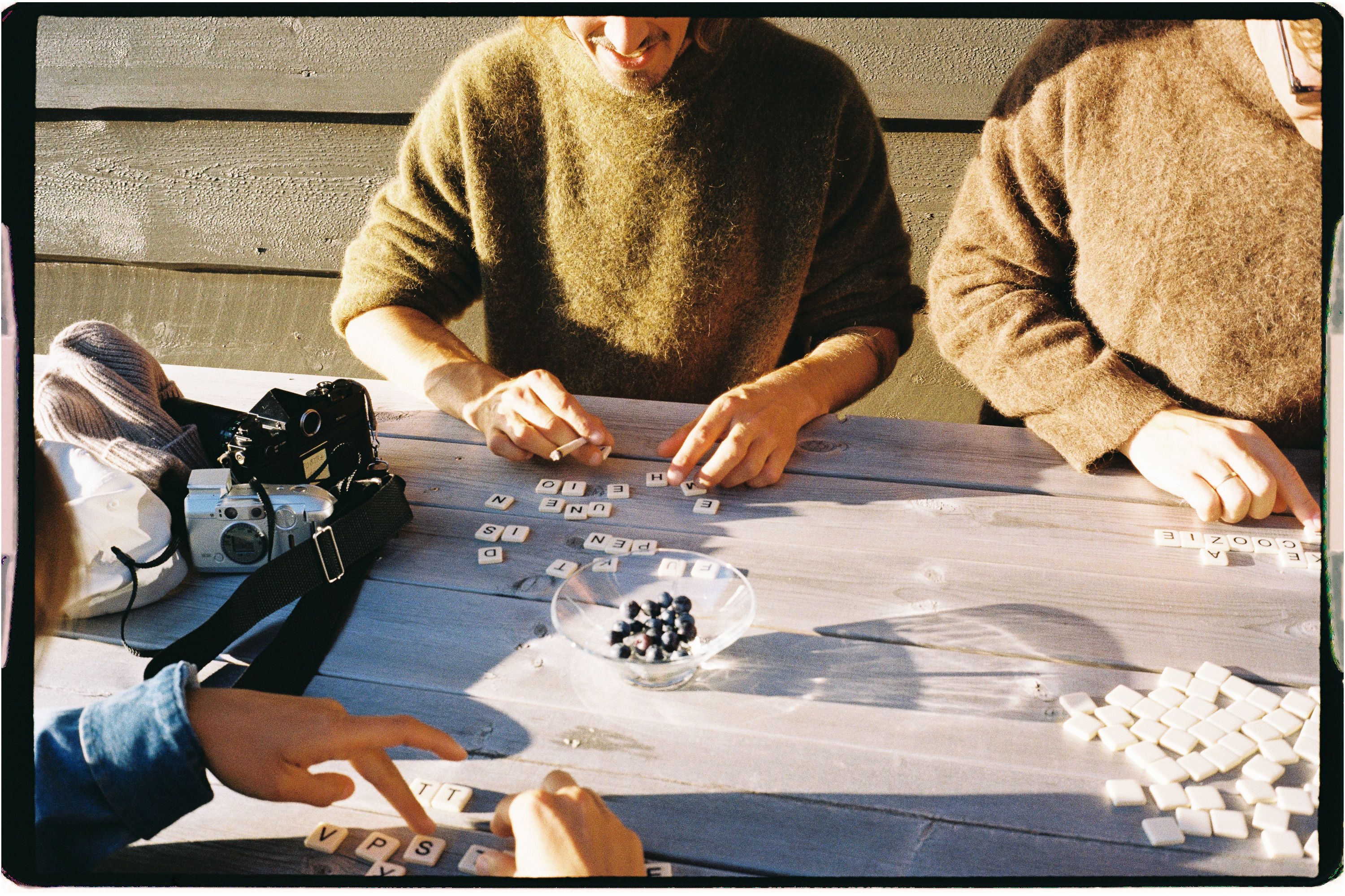 An image a of people playing a board game