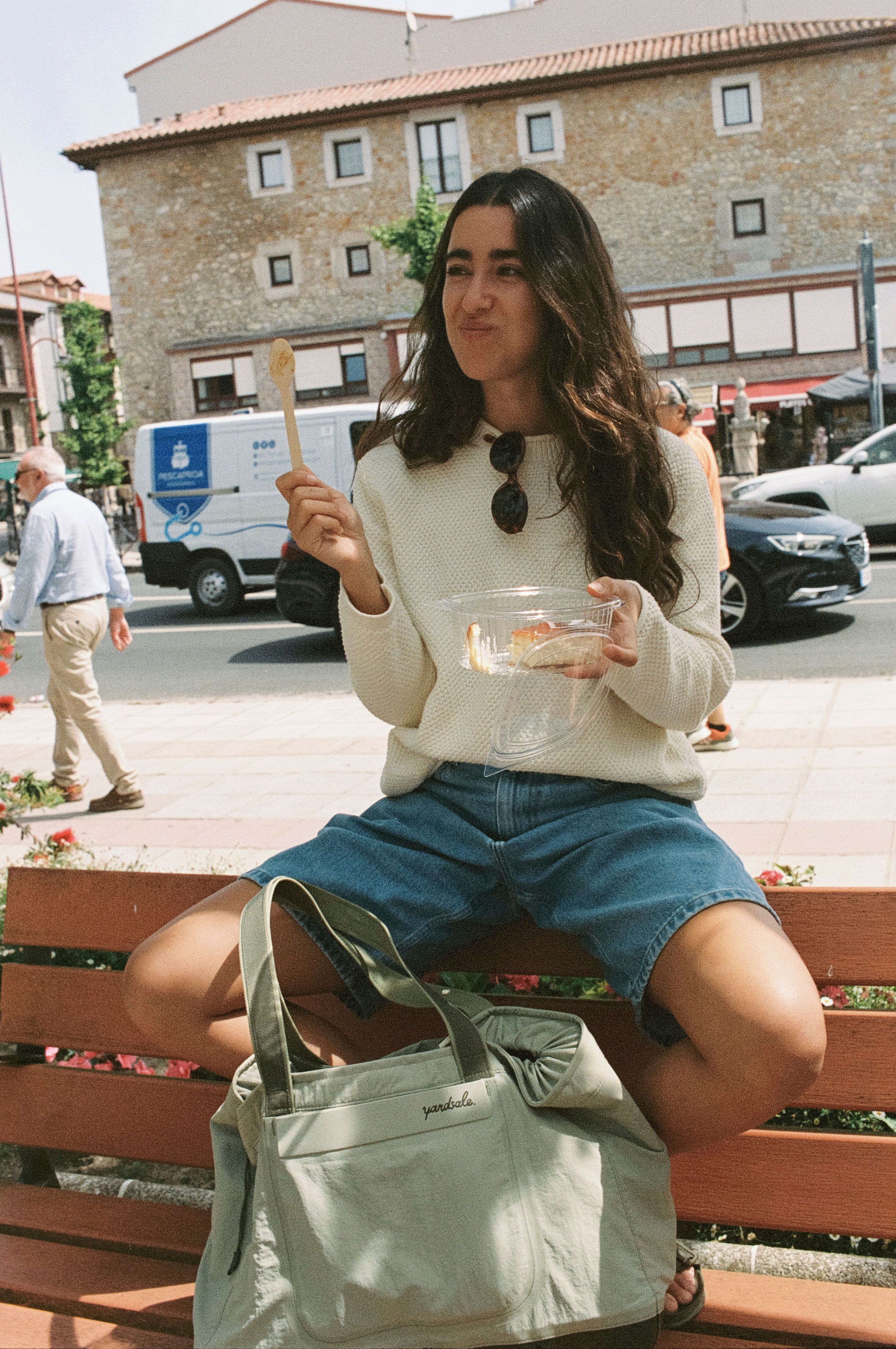 A close up image of the Verde Day Bag with the Cotton Surf Sweater