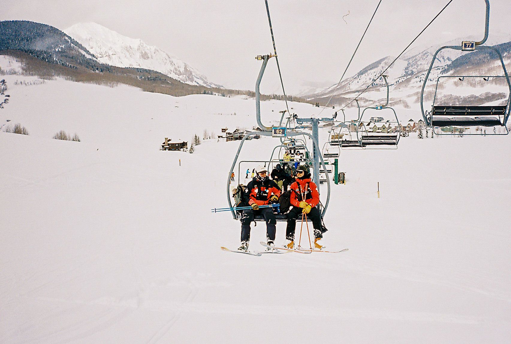 An image of a skiers on a chairlift