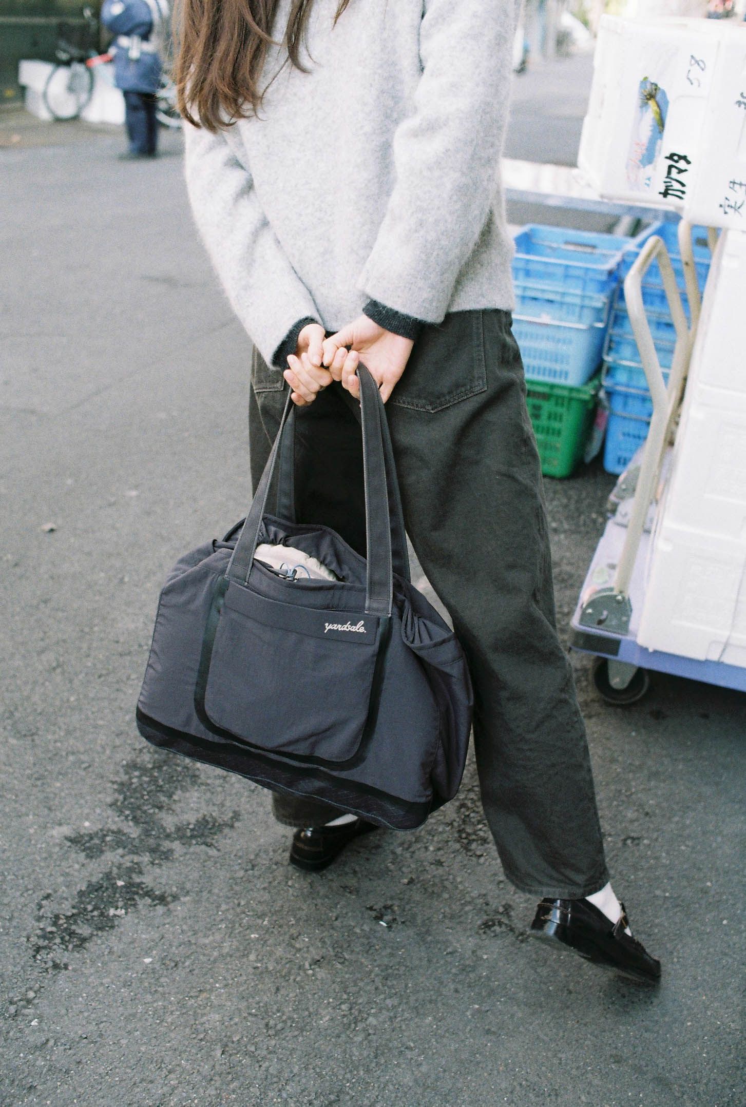 An image of a person using a Day Bag in Tokyo
