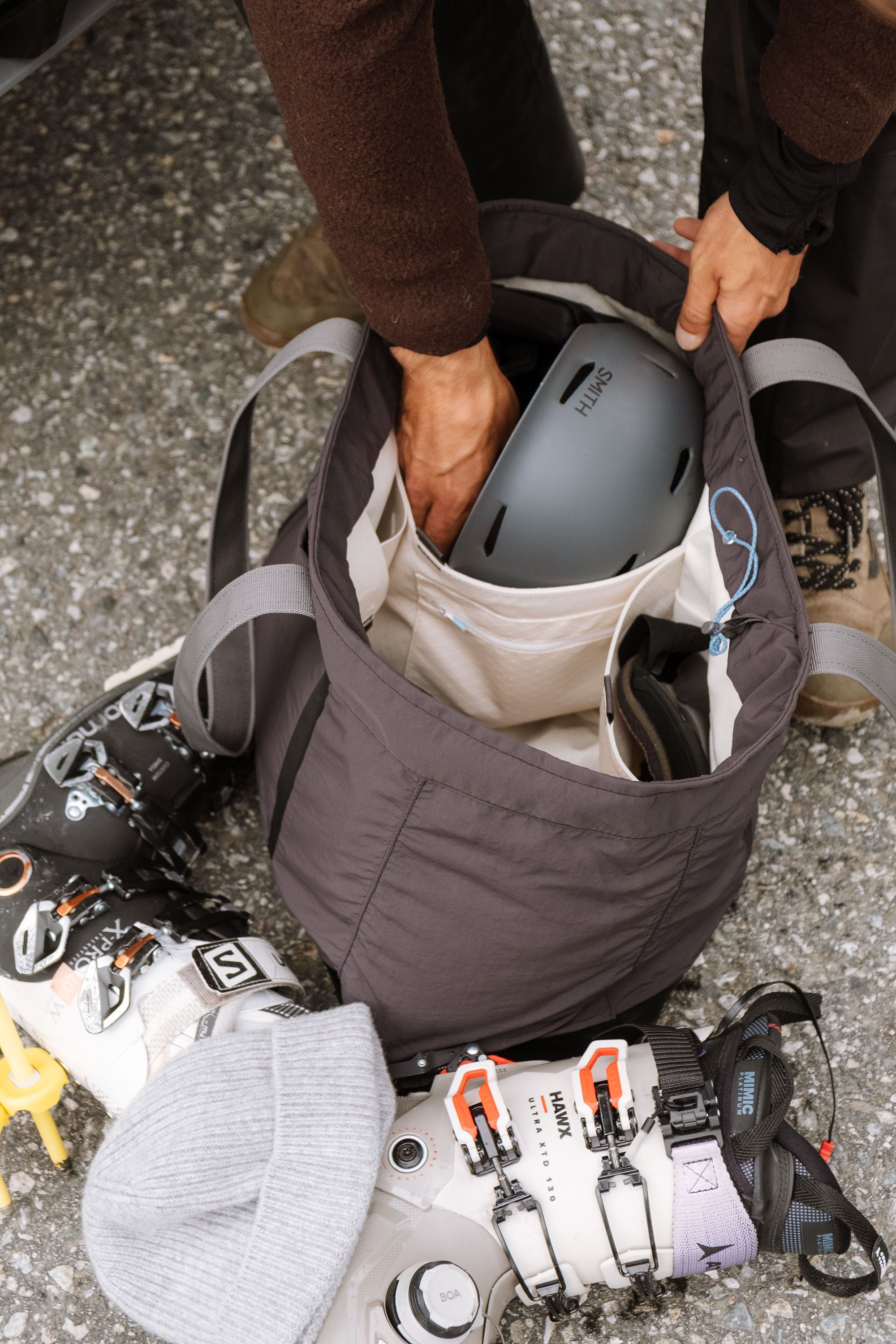 An image of a ski gear inside of a tote bag