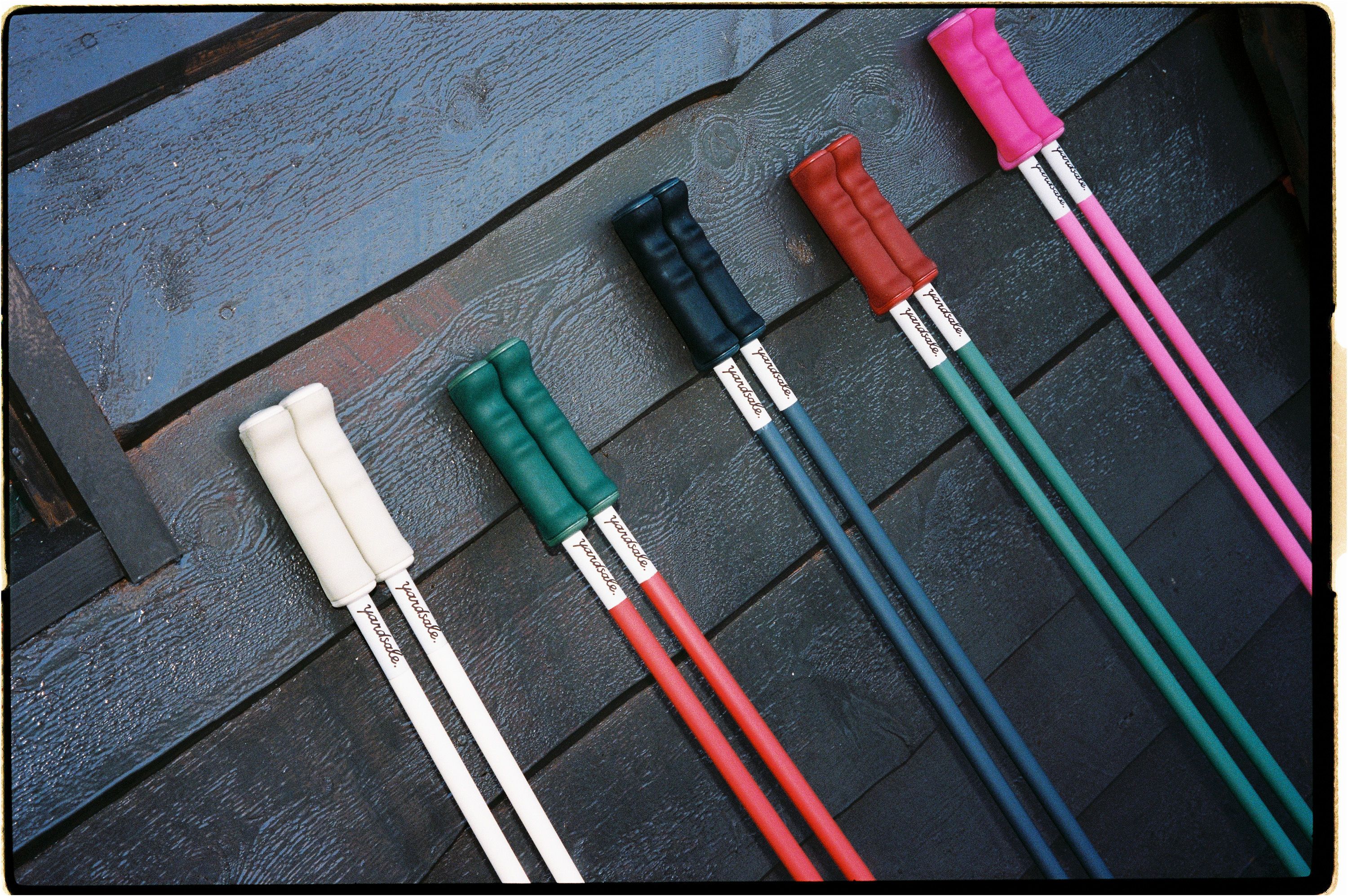 An image of multi colored ski poles