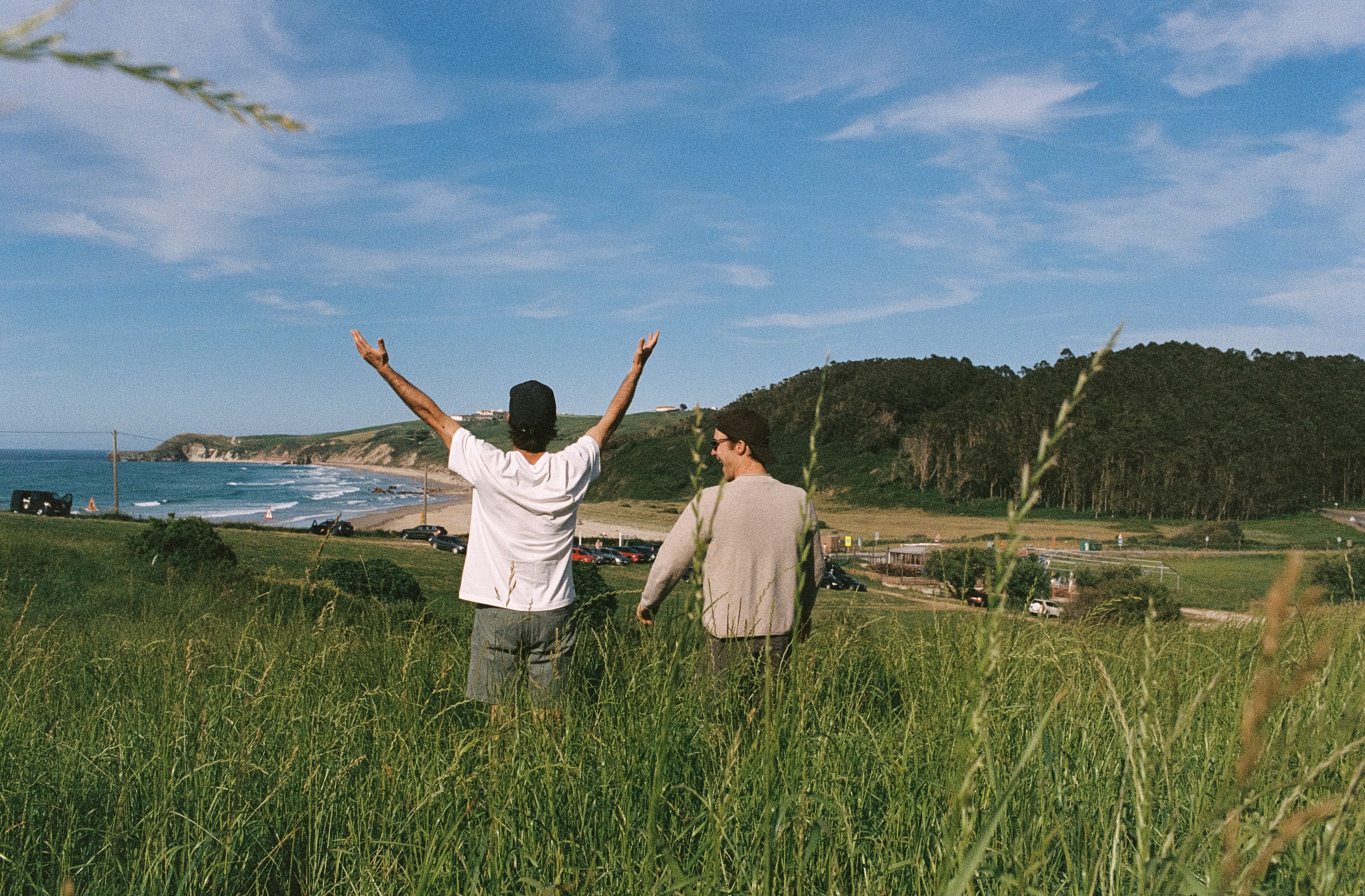 An image of two men in a field