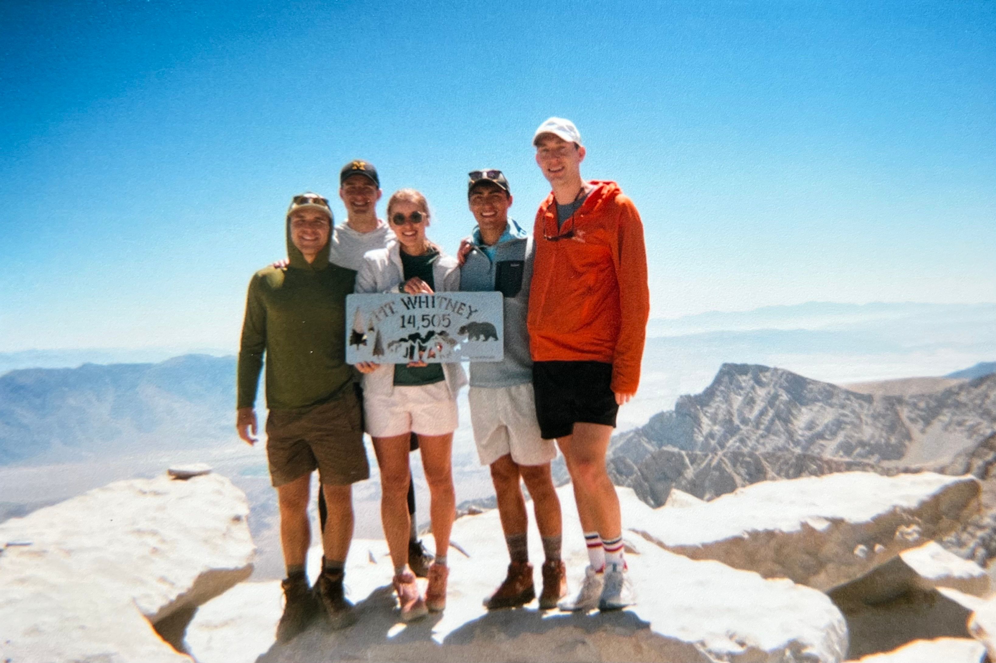 An image of people on top of a mountain