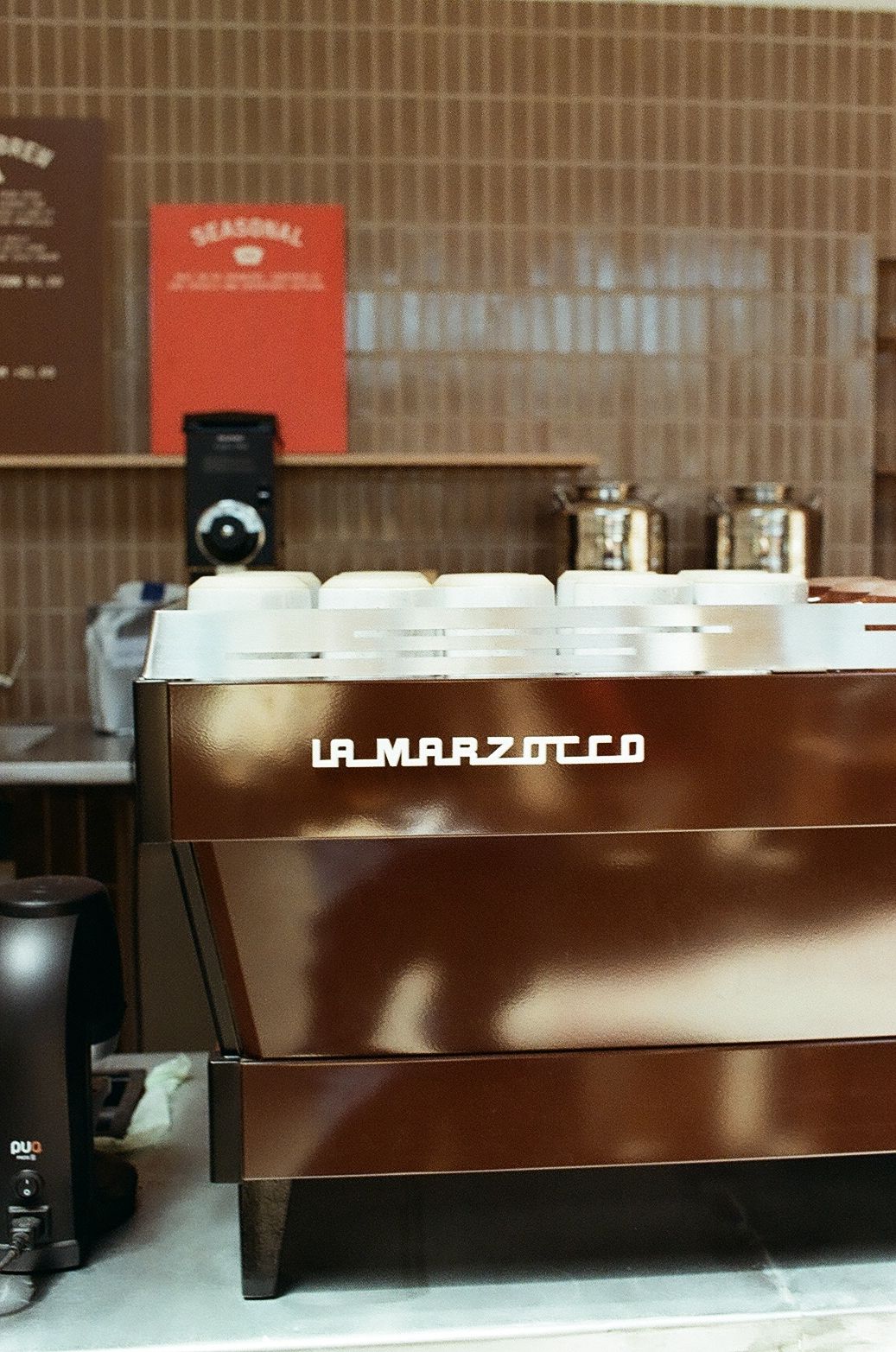 An image a of a person drinking a cup of coffee