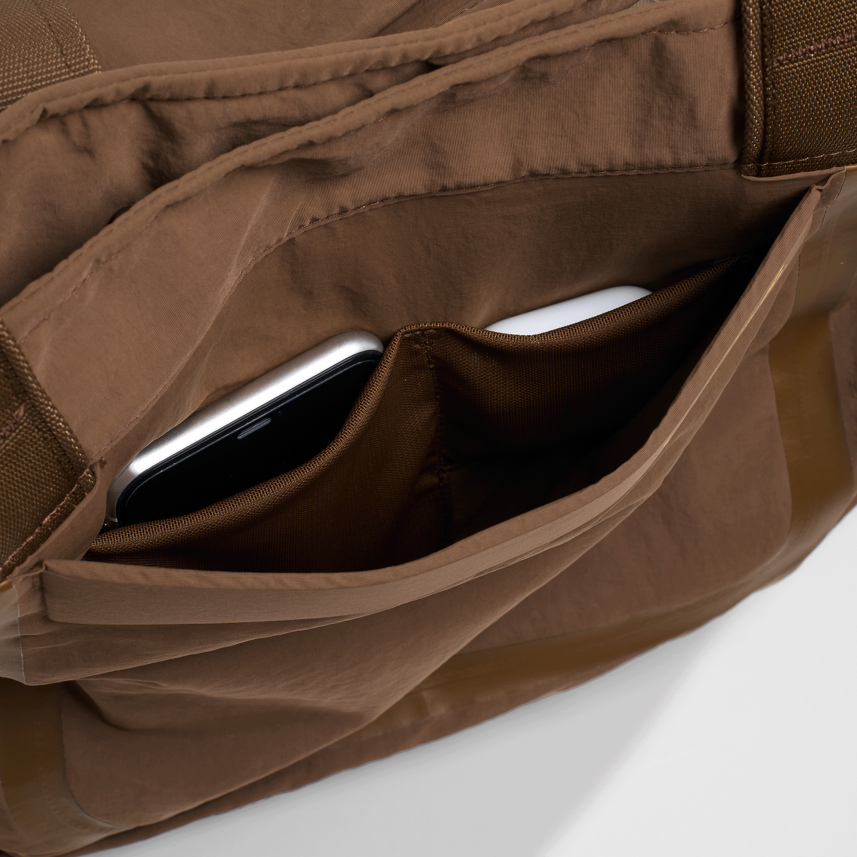 An image of Day Bag Brown pockets