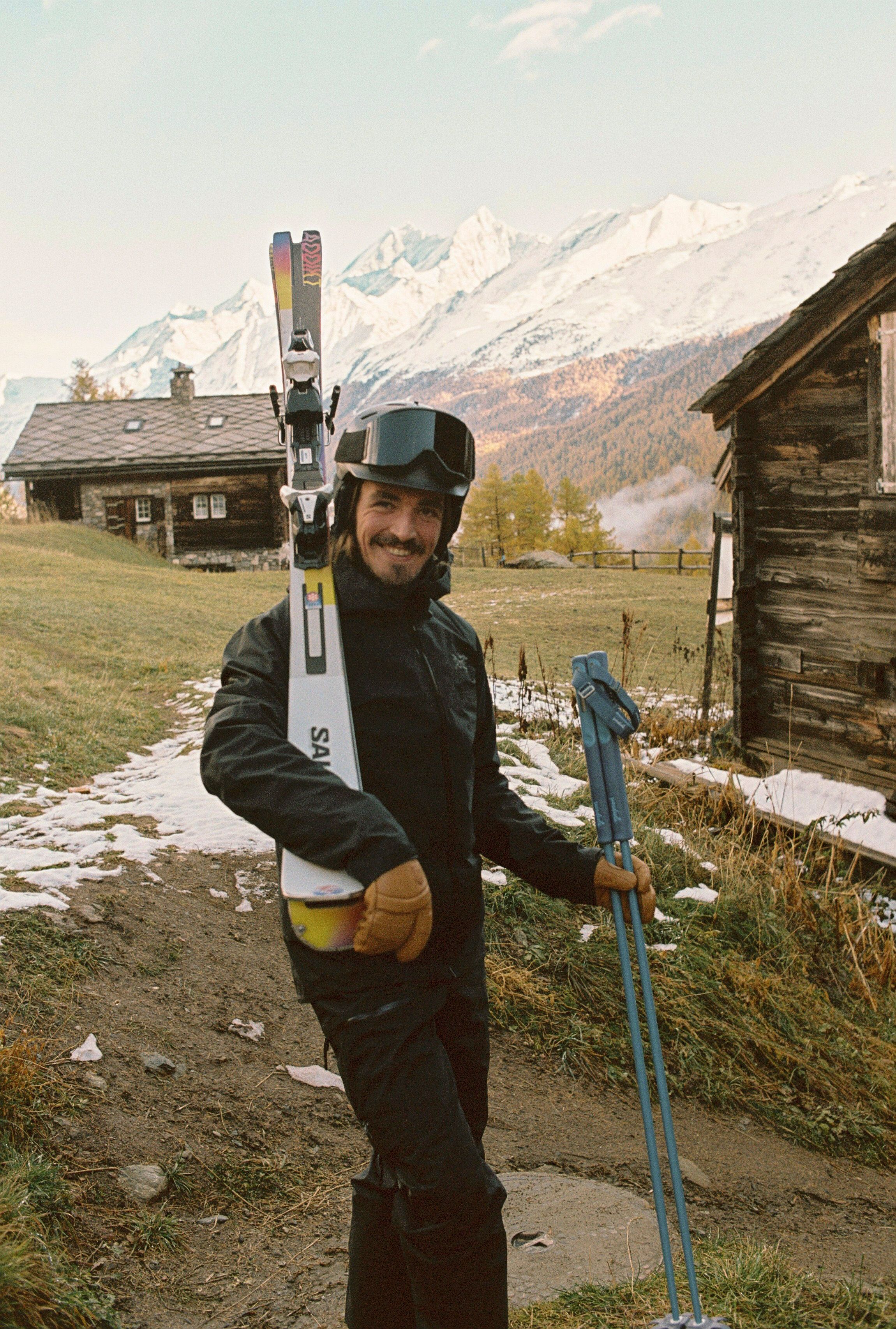 An image of a man about to go skiing