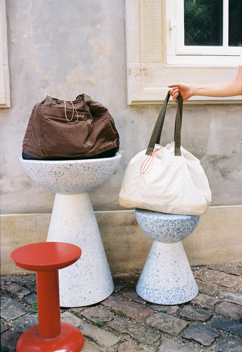 Image of bags on a pedestal