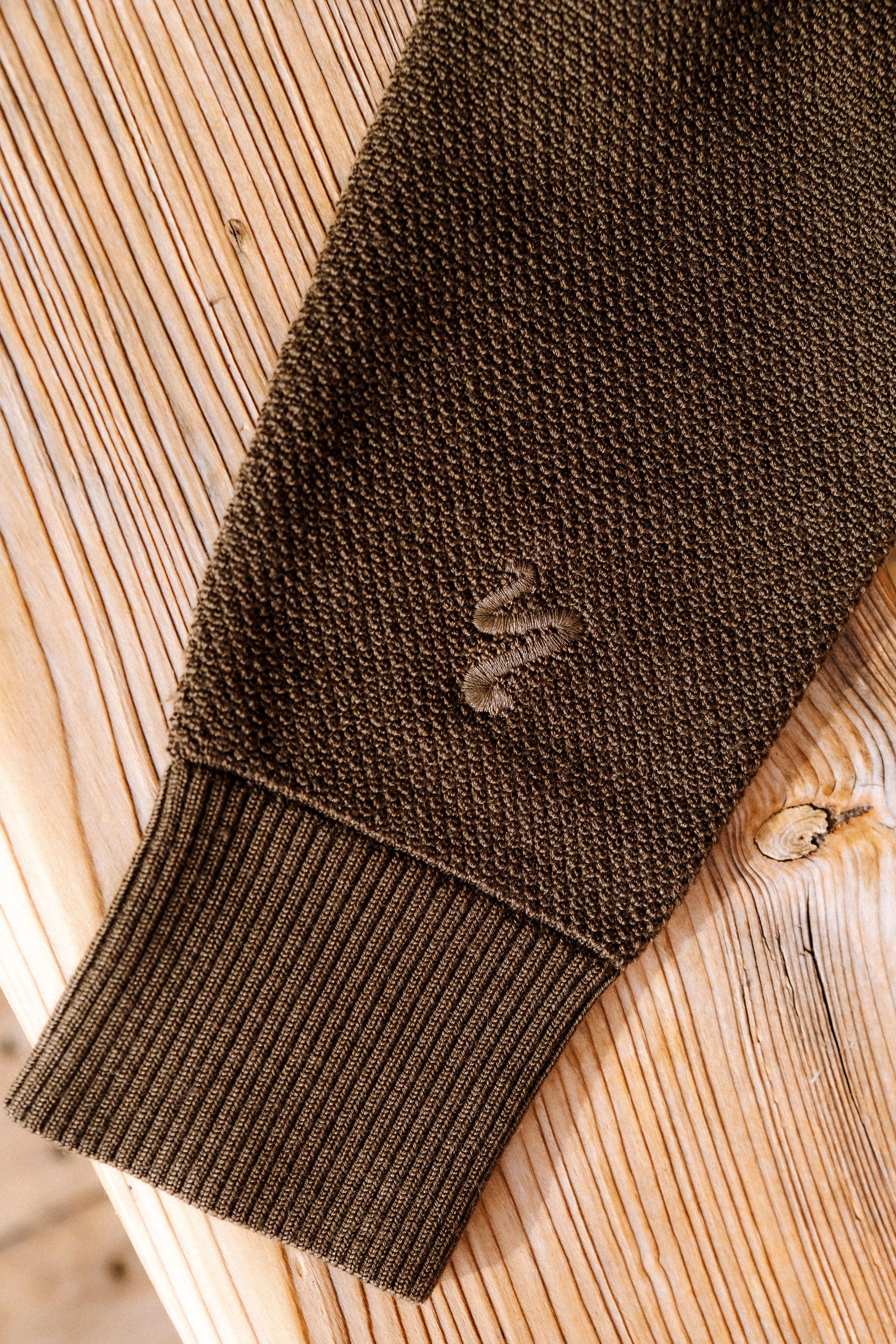 Image of a baselayer top embroidery detail