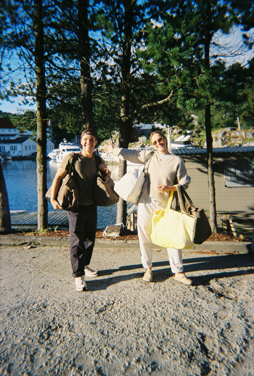 Kelly and Cristina standing with Day Bags