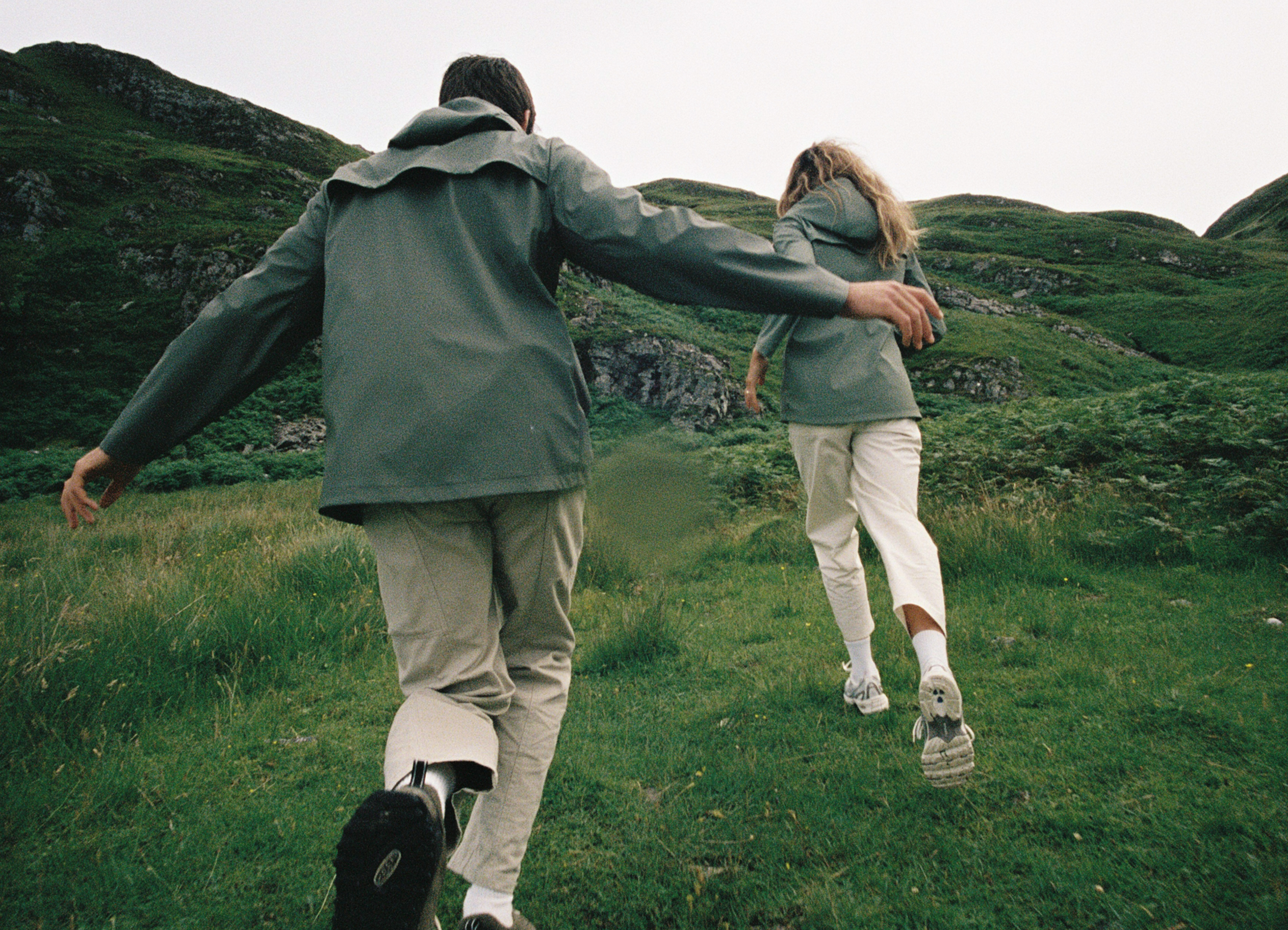An image of people running in the Highlands
