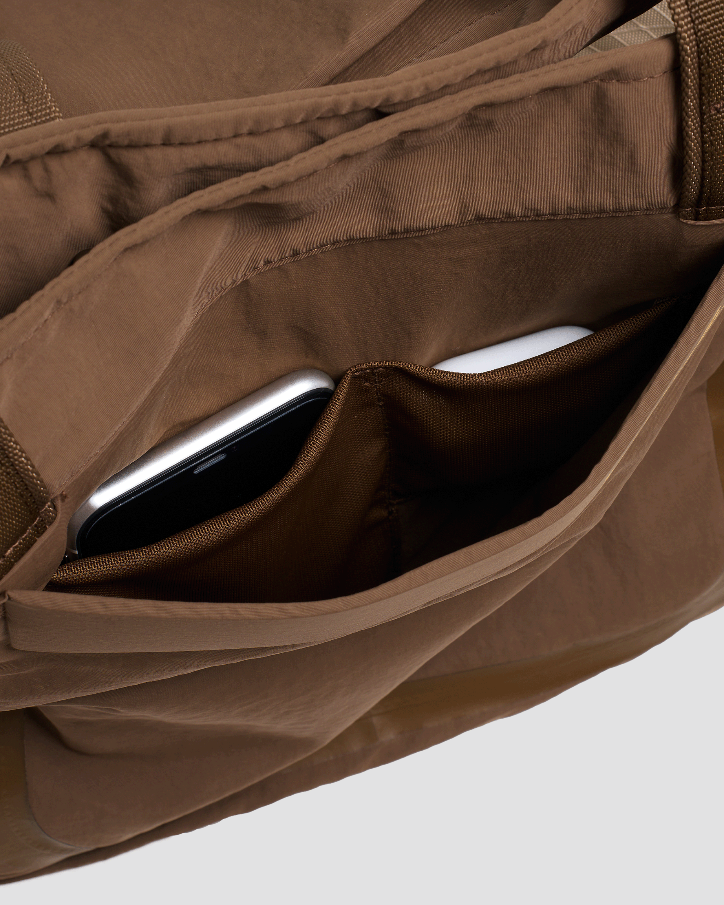 An image of 20L Day Bag Brown pockets