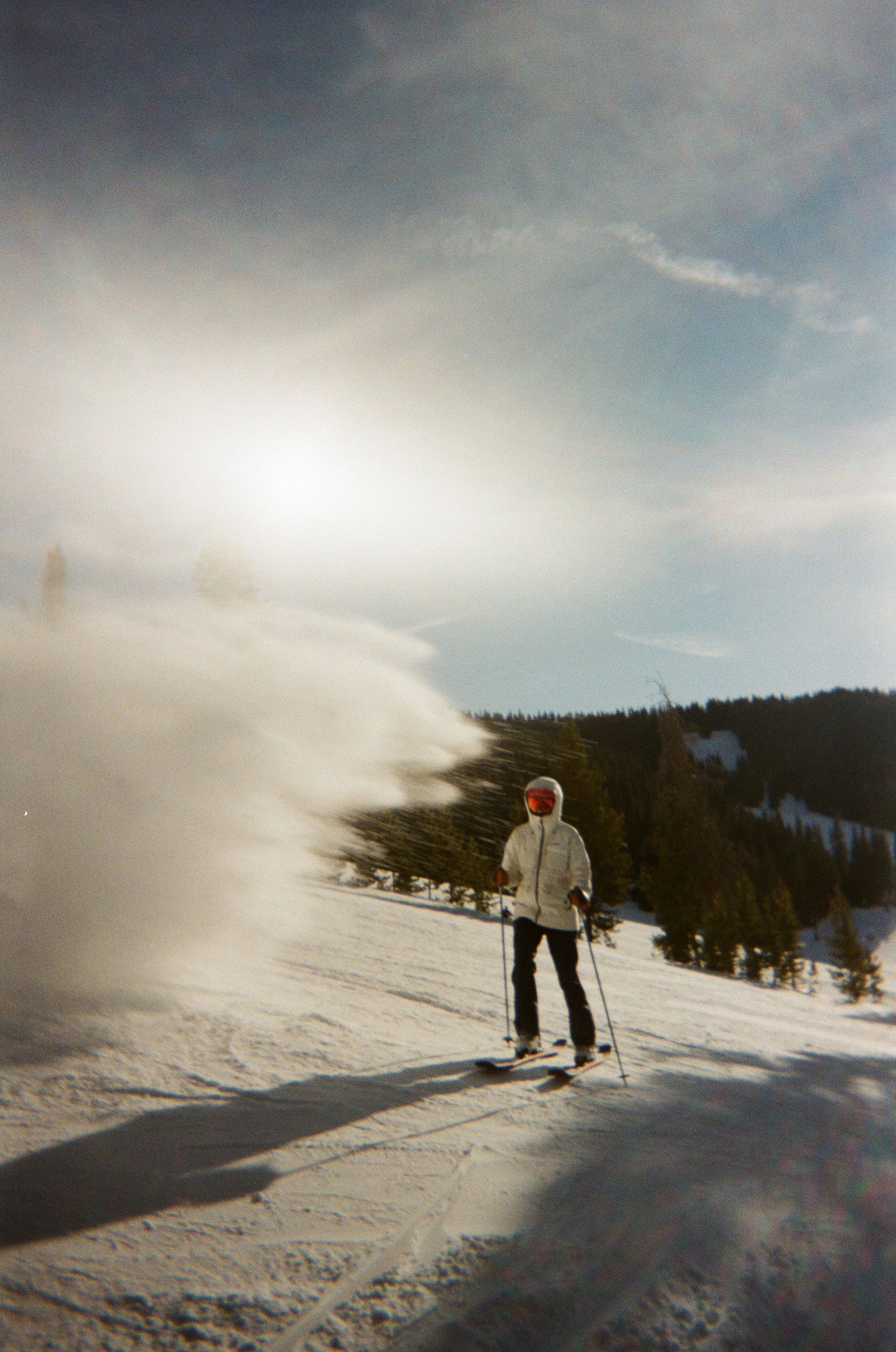 An image of a skier getting snow on them