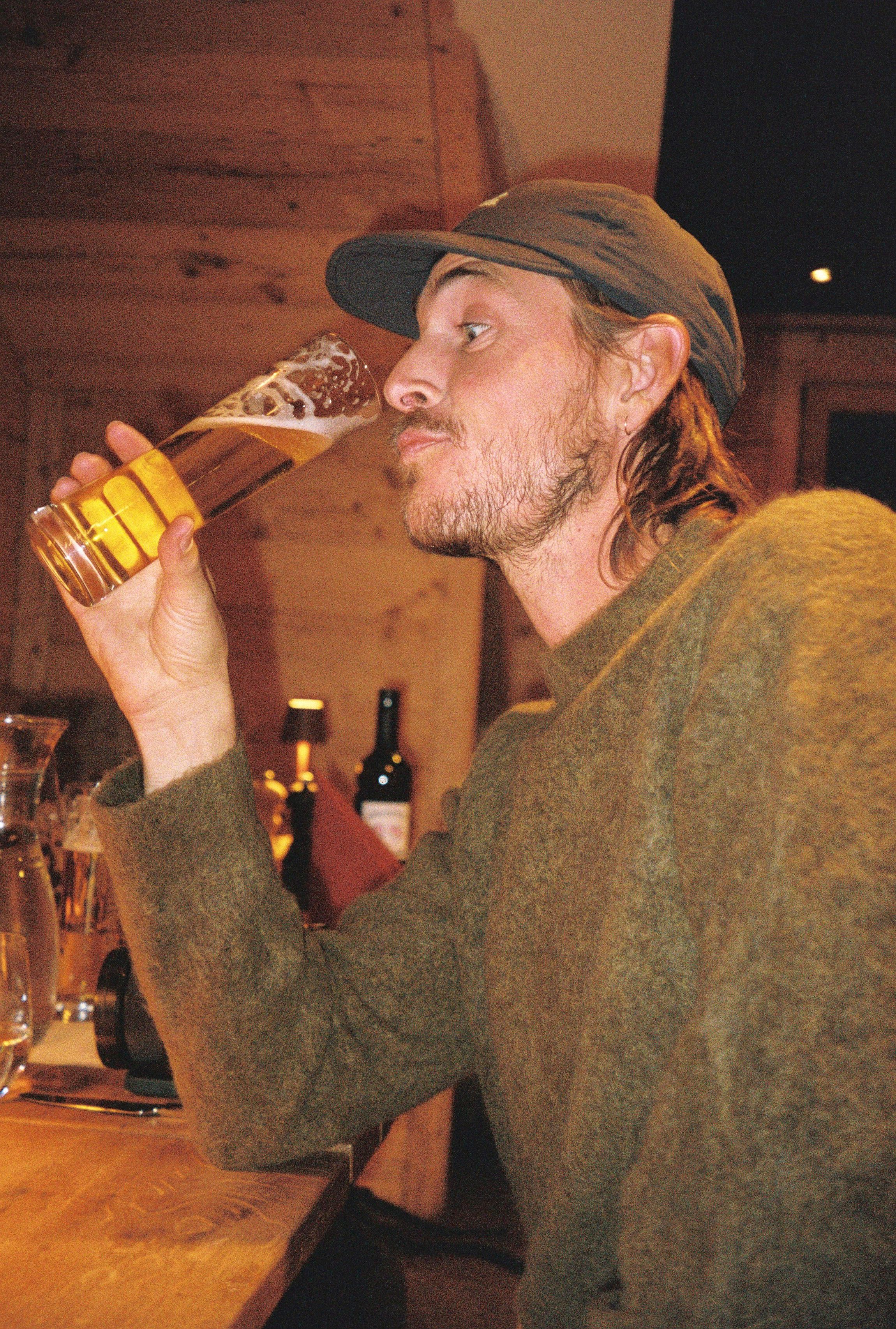 An image of a man in a wool alpaca sweater