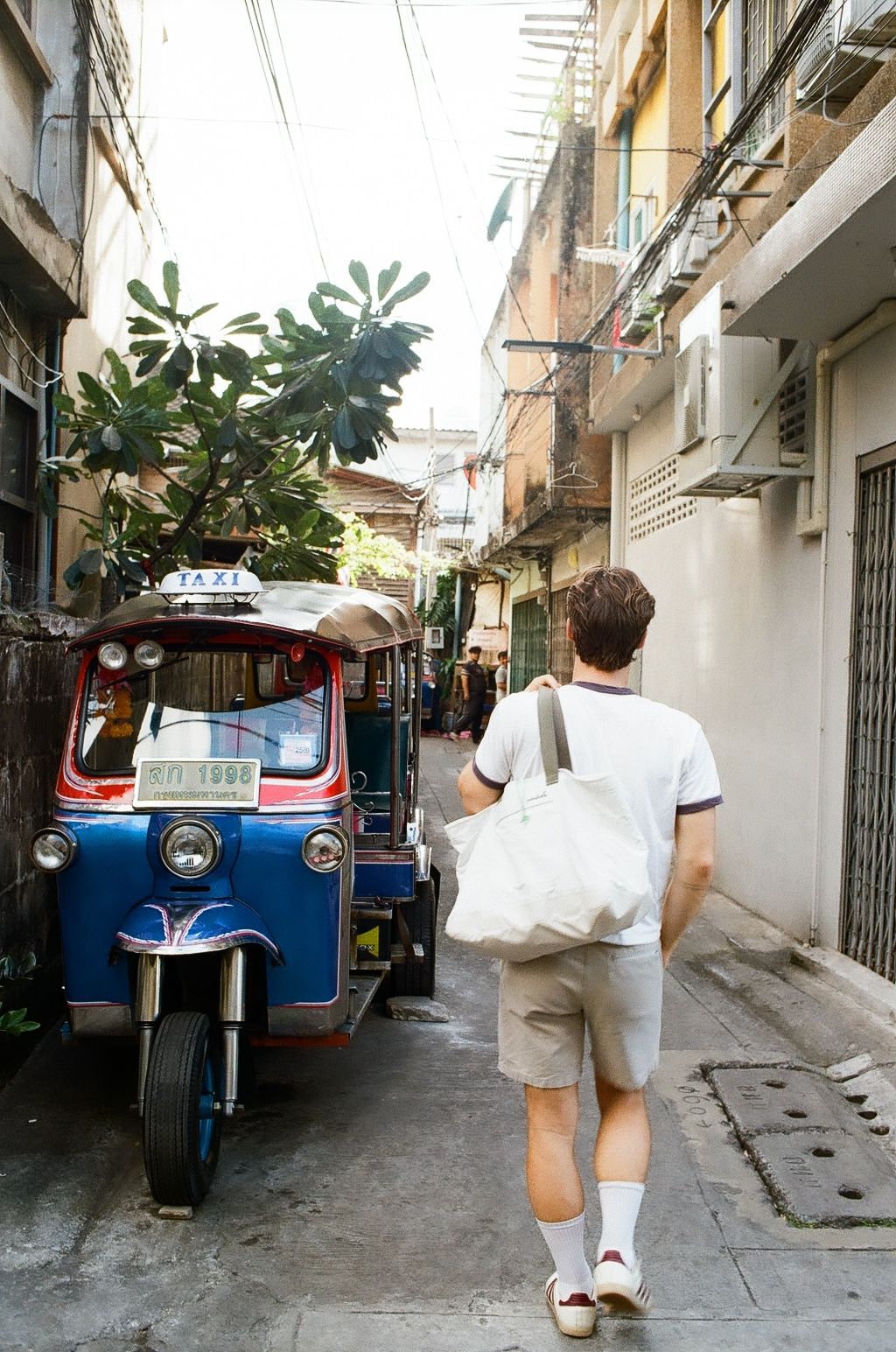 An image a of a person walking around Bangkok, Thailand