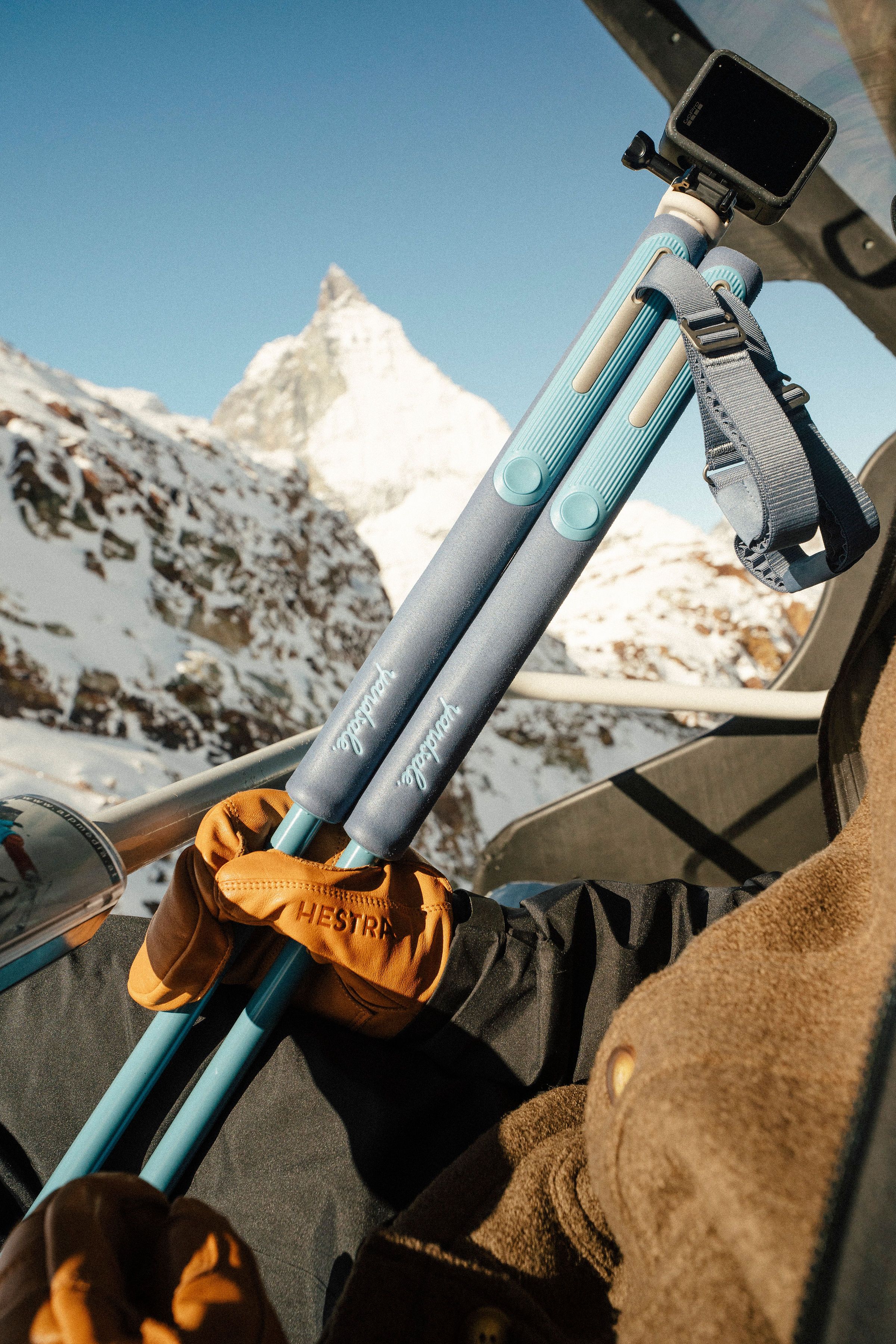 An image of ski poles on a ski lift 
